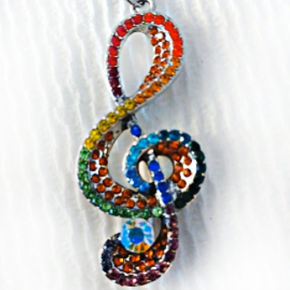 NWOT Gorgeous Rainbow Rhinestone Silvertone G Clef necklace - Picture 3 of 8